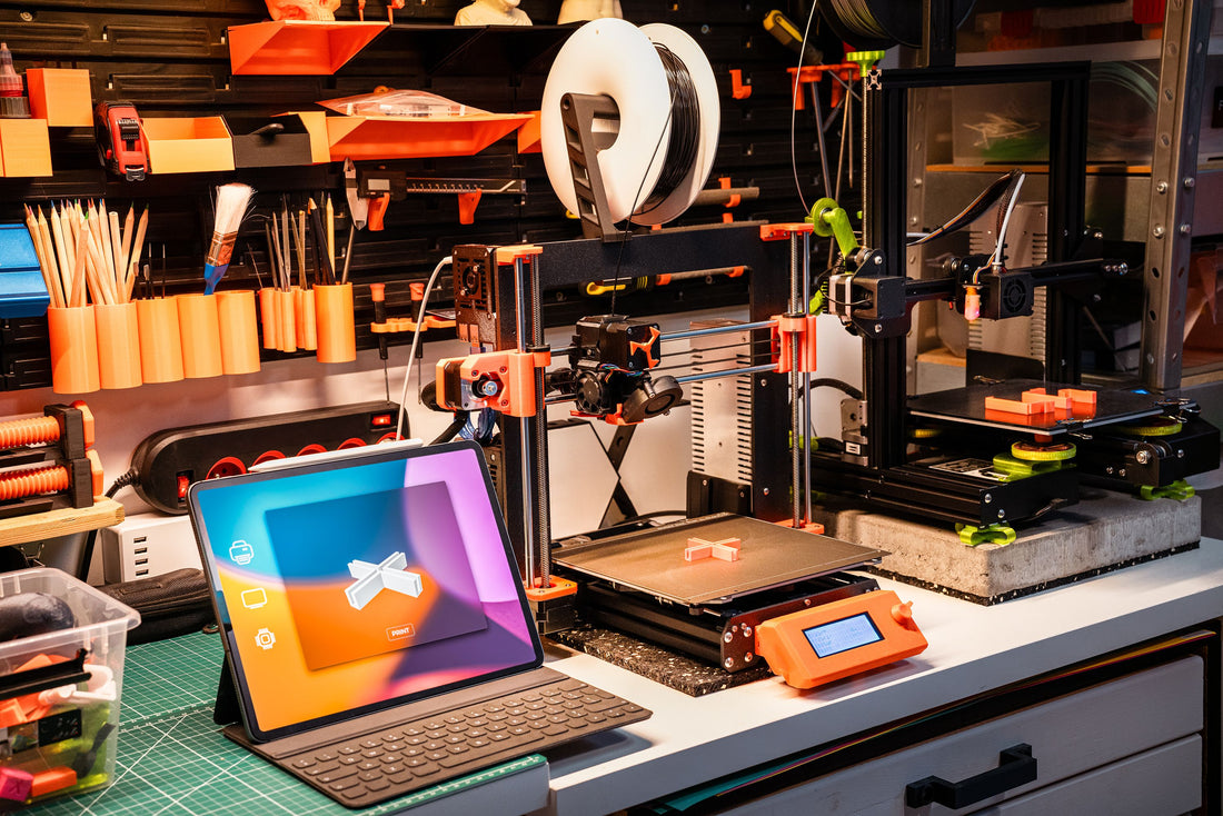 Multiple 3D printers in a production workshop for print farm fleet evaluation